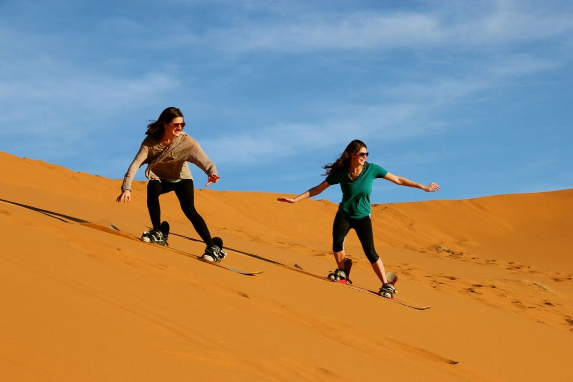 Dubai Desert Safari: Red Dunes Sandboarding, Live Show + Dinner - Photo 1 of 13